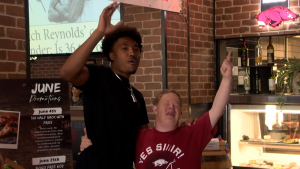 WATCH: Razorbacks help raise money for tornado relief at All American Steakhouse